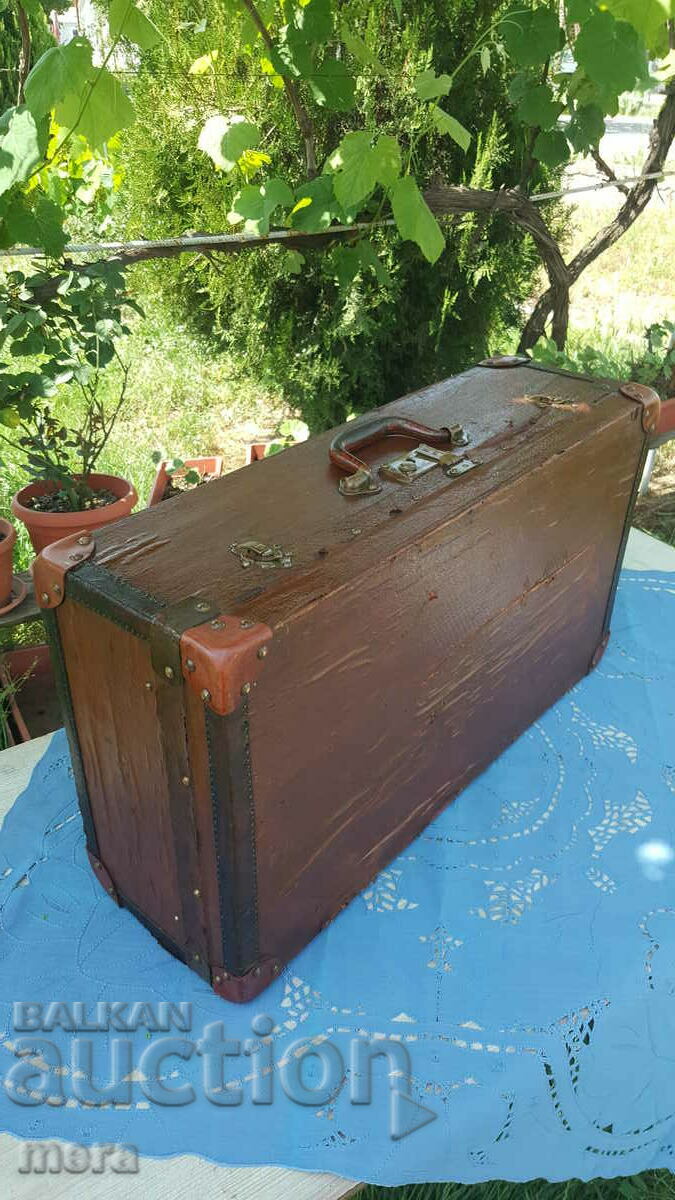 Antique wooden trunk with bronze fittings