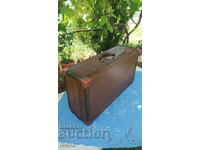 Antique wooden trunk with bronze fittings