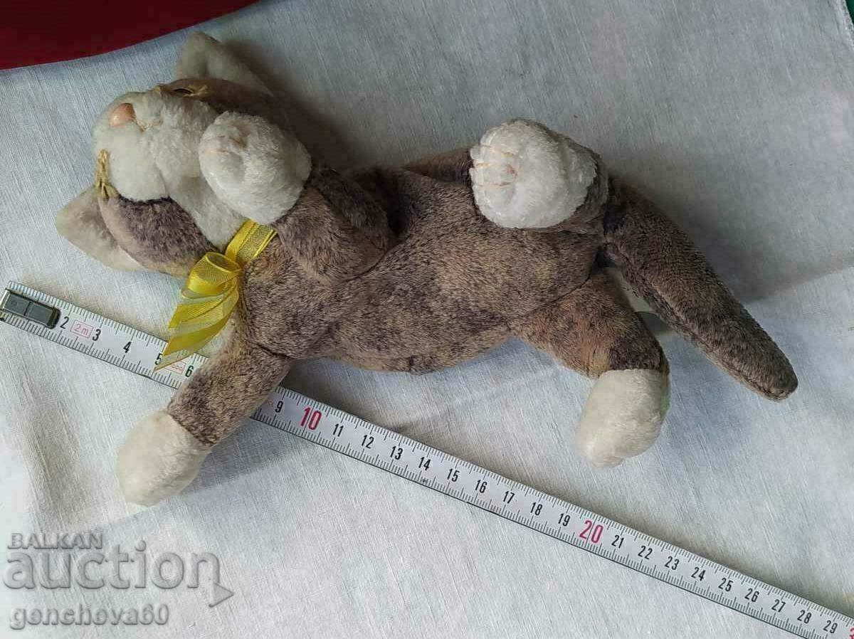 Auction Collectible plush kitten and ceramic amphora Auction Collectible plush kitten and ceramic amphora