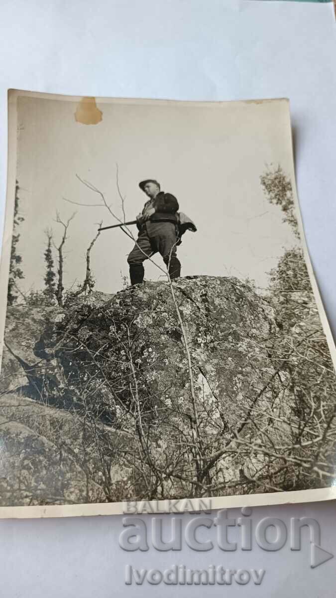 Photo Man on a Rock