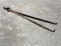 Old dilaf, tongs, wrought iron for foot