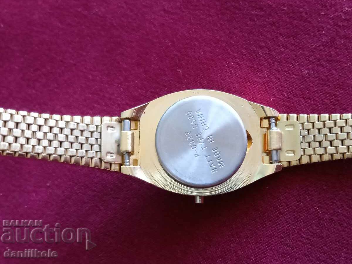 Delivery of *$*Y*$* WOMEN'S TEMPIC ELECTRONIC WATCH - LIKE NEW *$*Y*$*