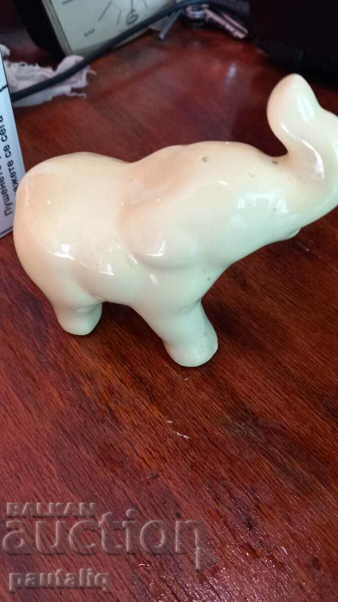 Auction PORCELAIN ELEPHANT FIGURE Auction PORCELAIN ELEPHANT FIGURE