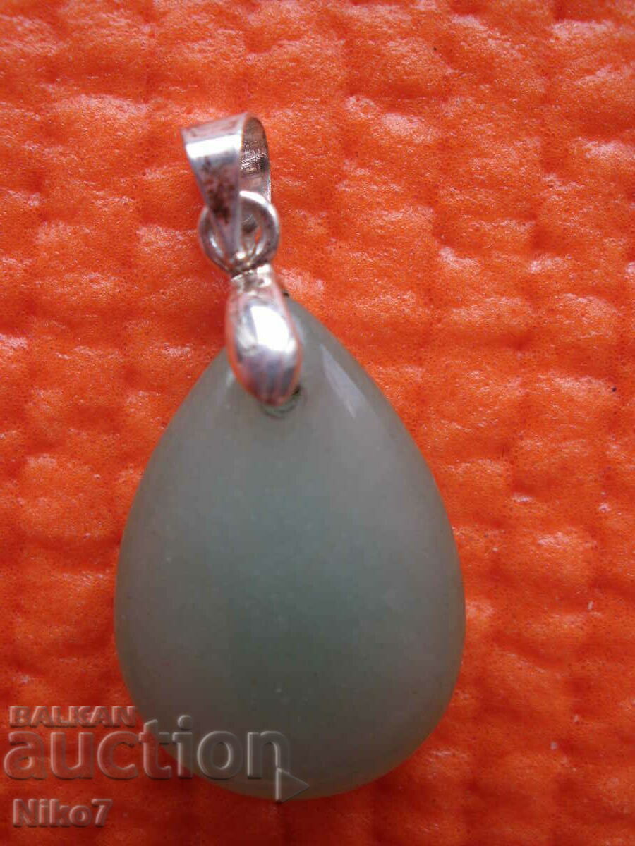 Pendant - natural, milky-green stone. Pendant - natural, milky-green stone.