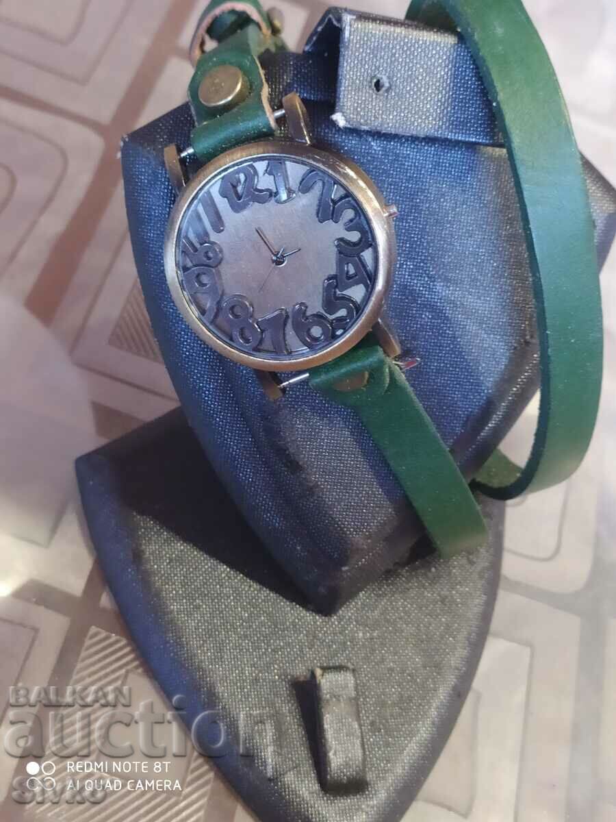 Auction Watch long green strap Auction Watch long green strap