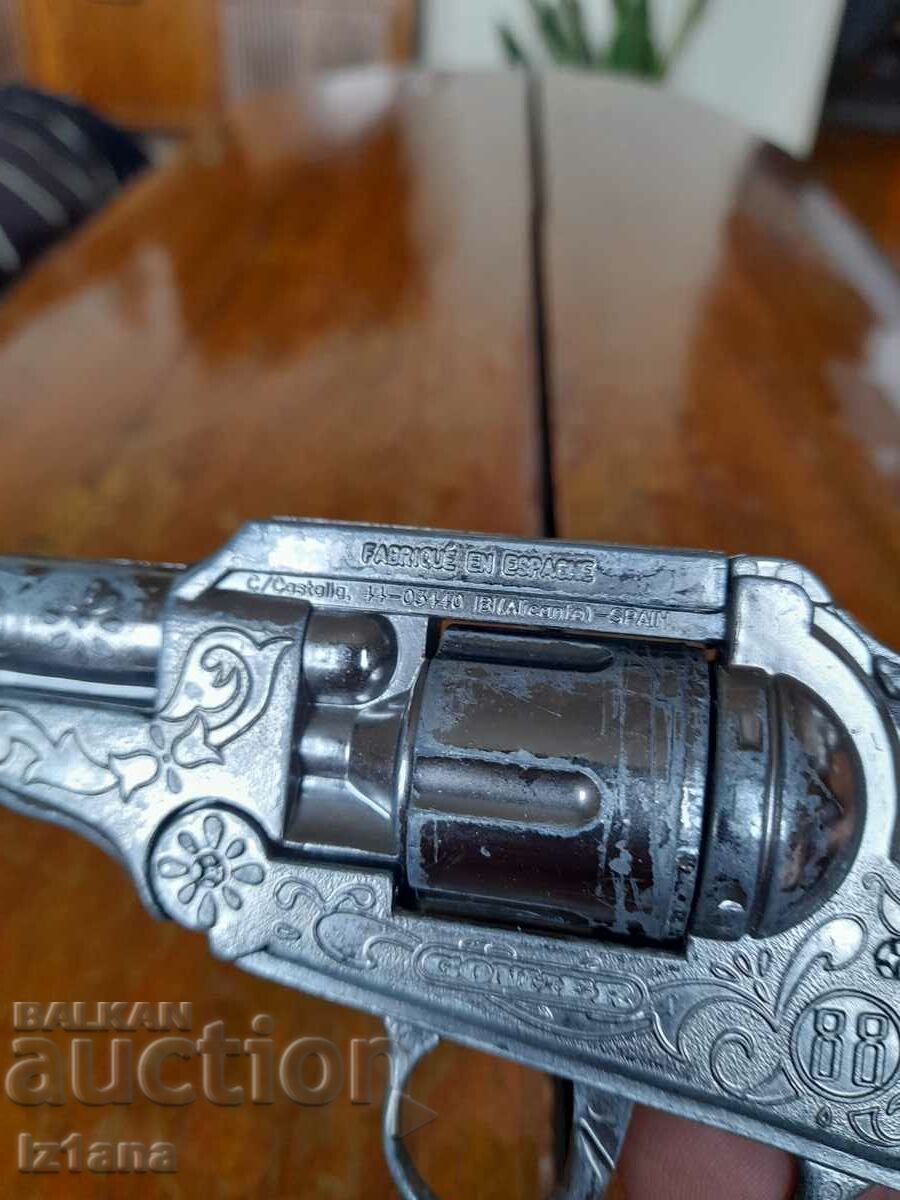 Auction  An old cartridge gun