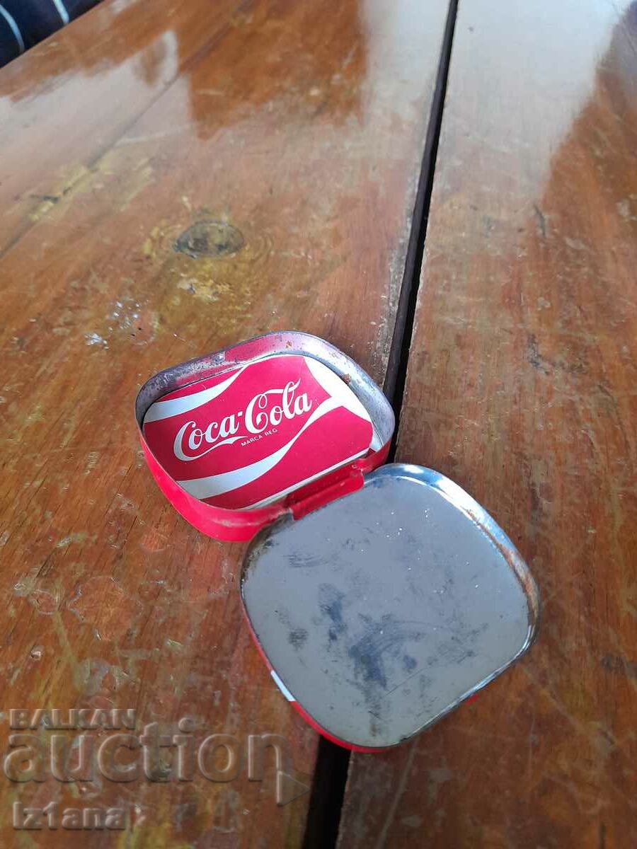 Delivery of A box with Coca Cola leaves, Coca Cola