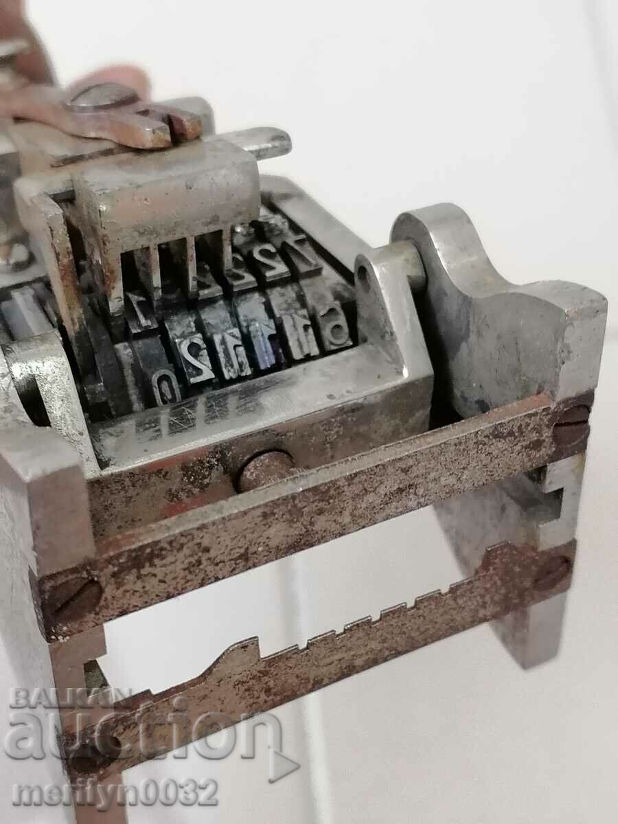 An old stamp with rotating digits - 5