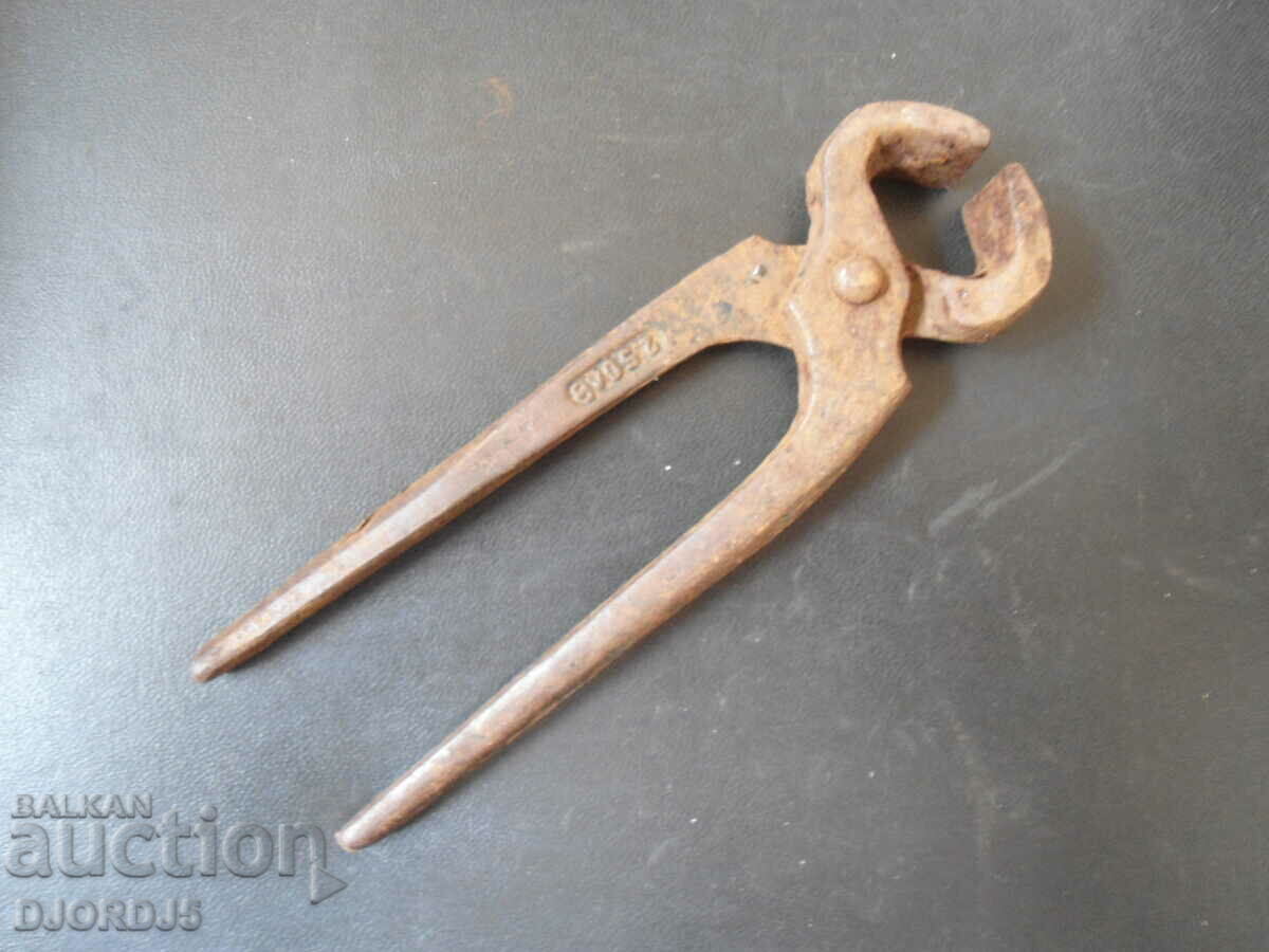 Old pliers marked