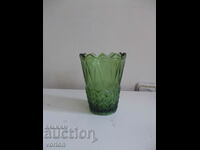 Old green glass vase.