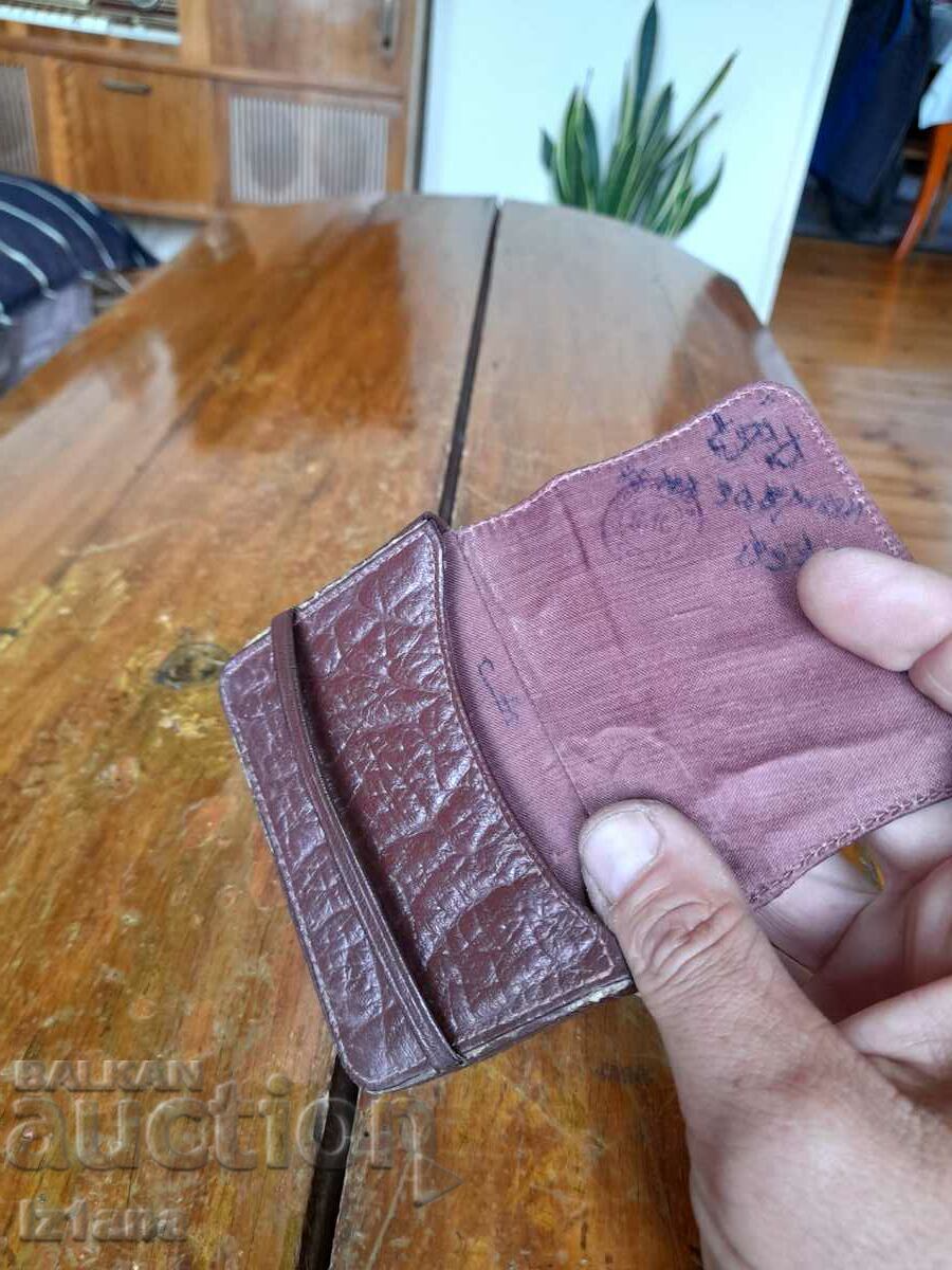 Delivery of An old leather purse Delivery of An old leather purse