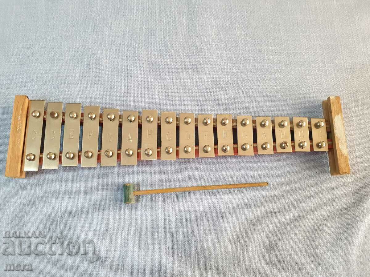 An old children's toy dulcimer in its original packaging