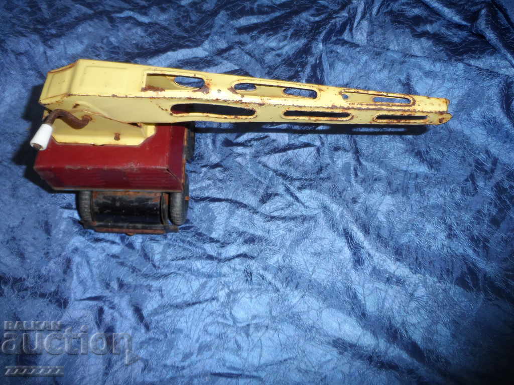 Livrarea o jucărie veche de tablă