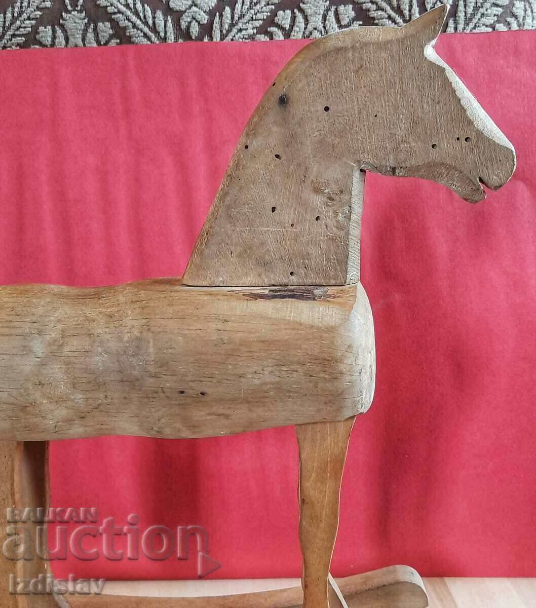 Auction  Vintage wooden toy rocking horse.