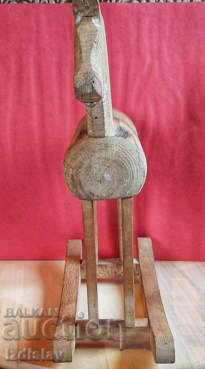 Delivery of Vintage wooden toy rocking horse.
