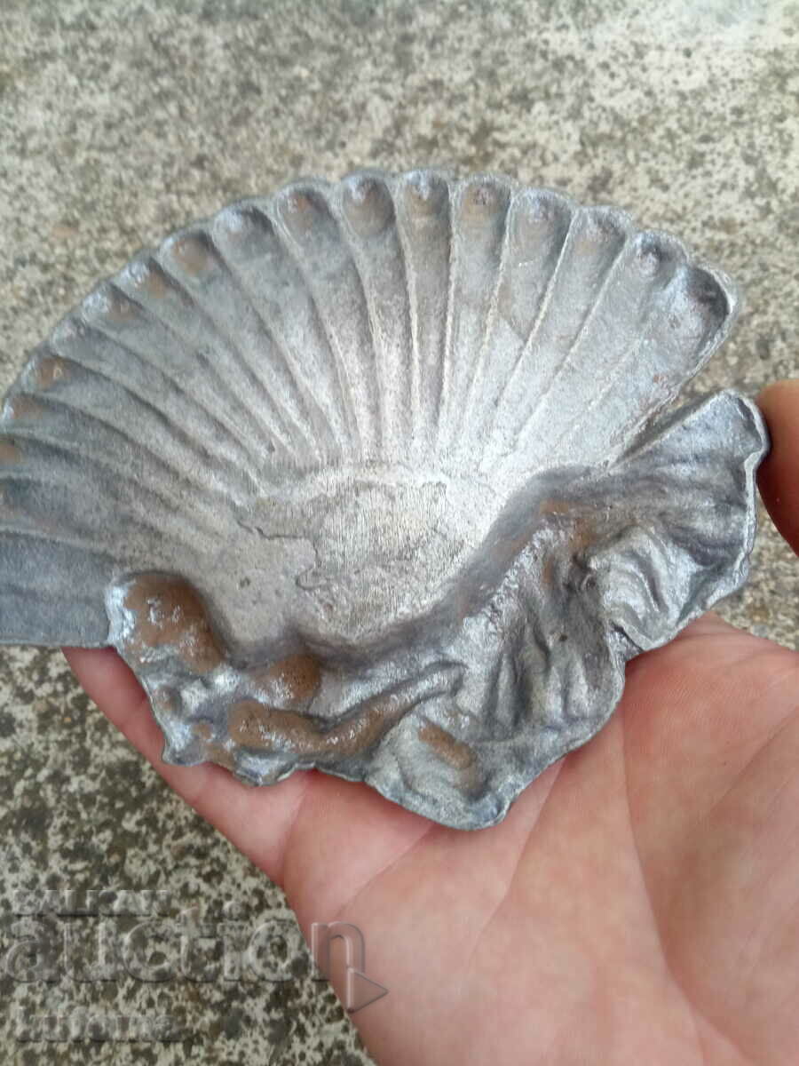 Delivery of Old aluminum ashtray