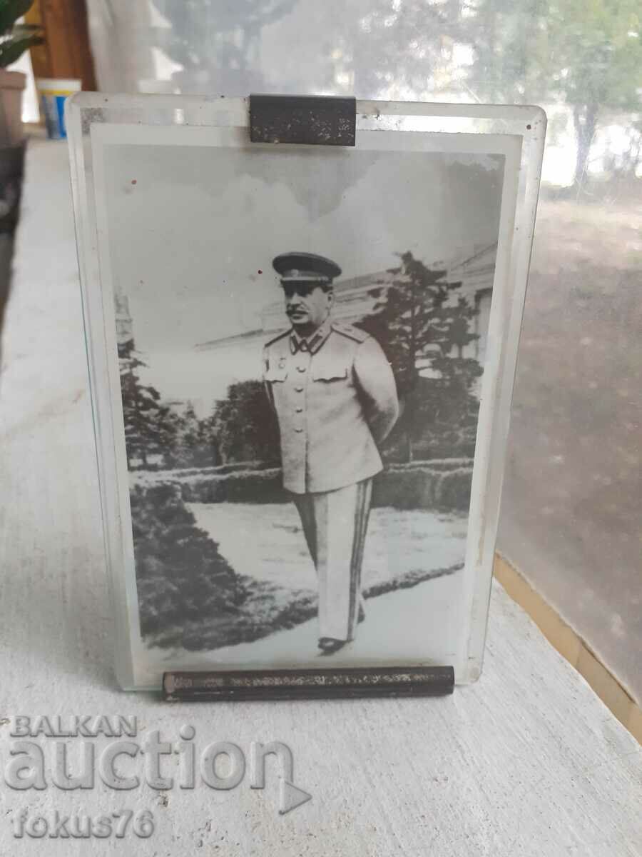 Old photo of Stalin in a glass frame