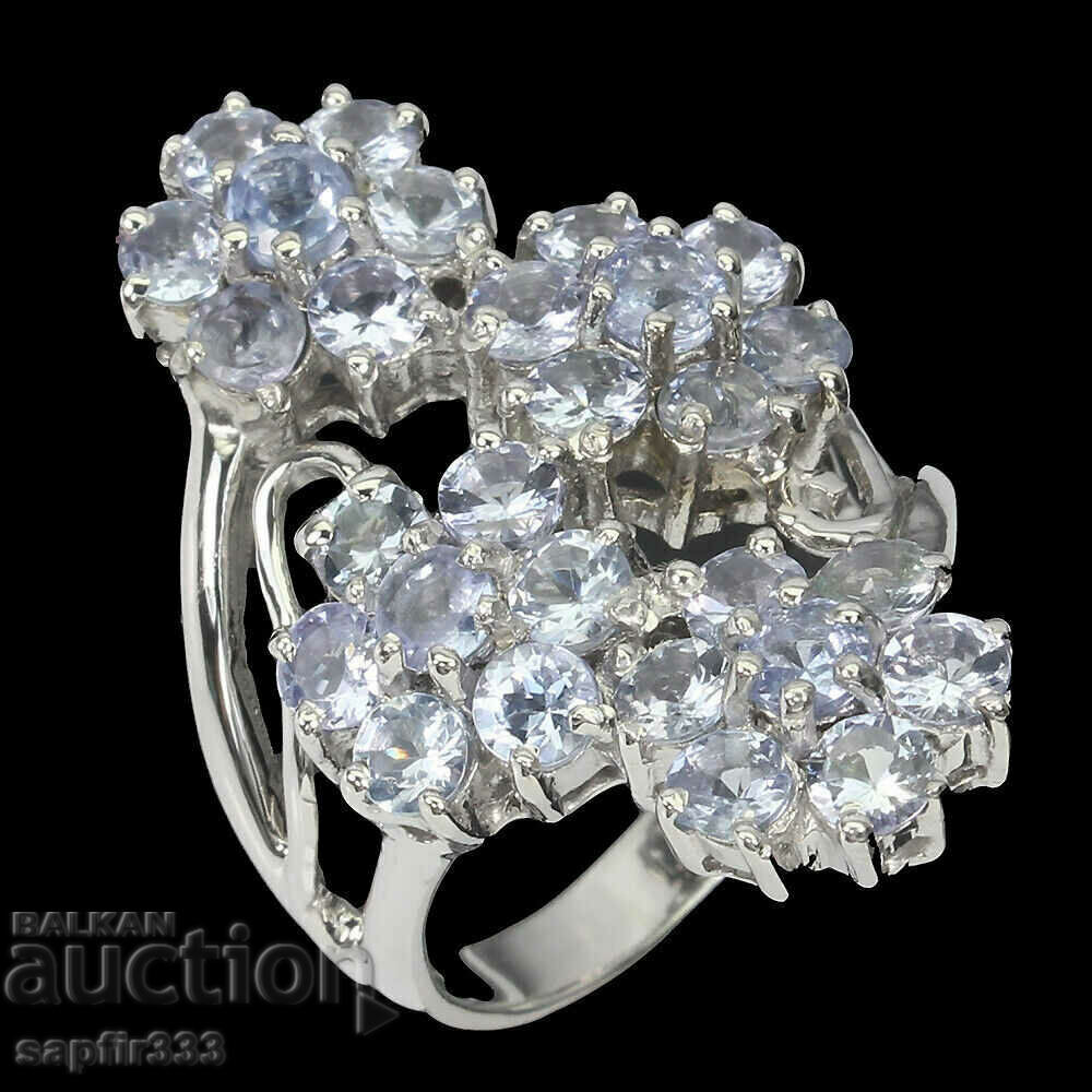 Auction GORGEOUS DESIGNER ELEGANT RING WITH NATURAL TANZANITES Auction GORGEOUS DESIGNER ELEGANT RING WITH NATURAL TANZANITES