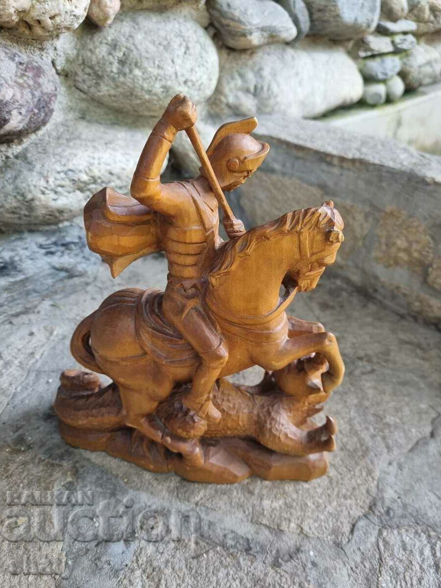Auction Wooden statuette of St. George slaying the dragon Auction Wooden statuette of St. George slaying the dragon