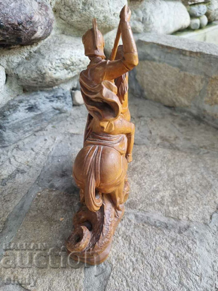 Delivery of Wooden statuette of St. George slaying the dragon Delivery of Wooden statuette of St. George slaying the dragon