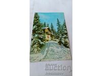 Пощенска картичка Хижа в планината през зимата
