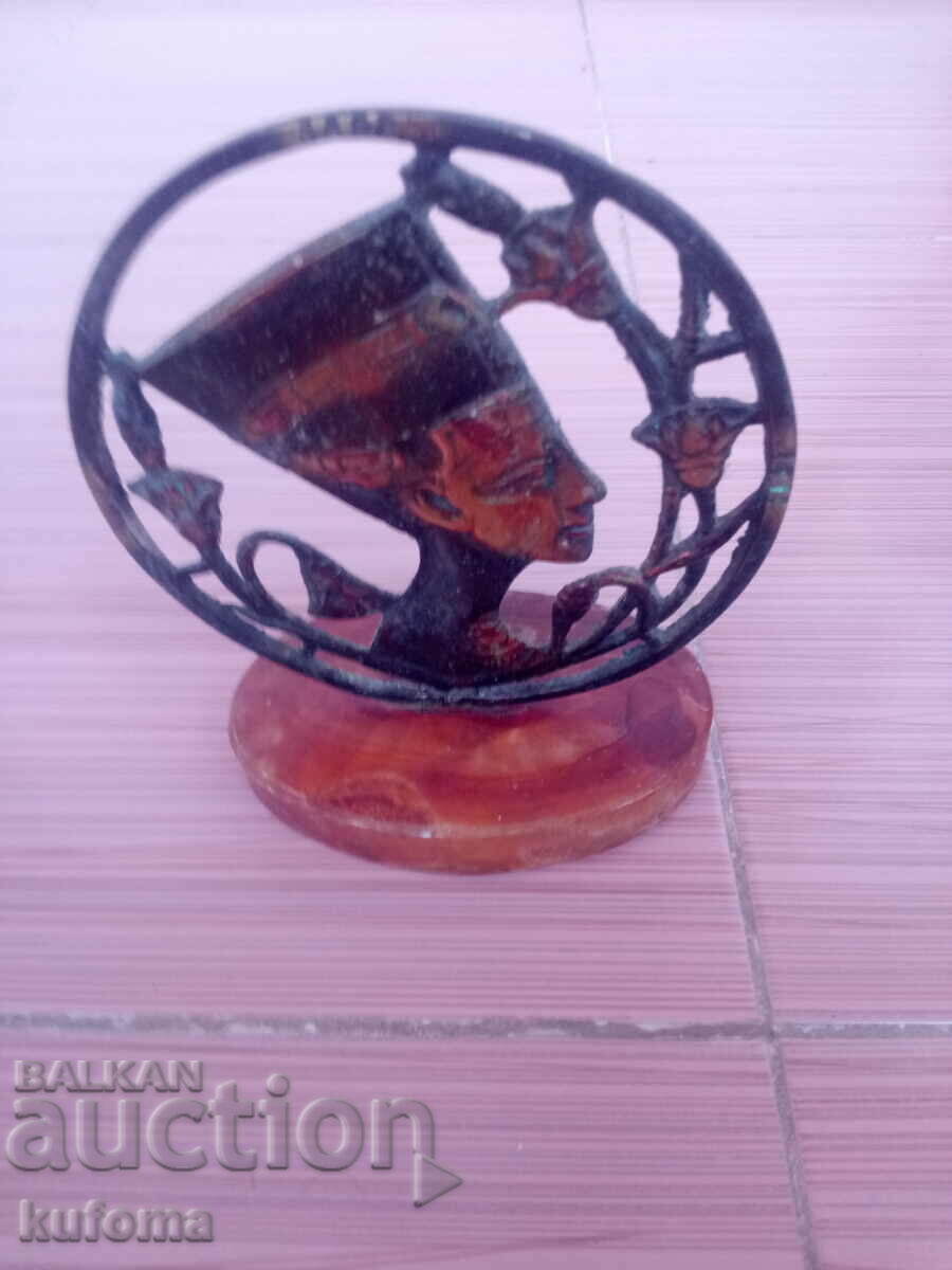 Copper statuette with marble base