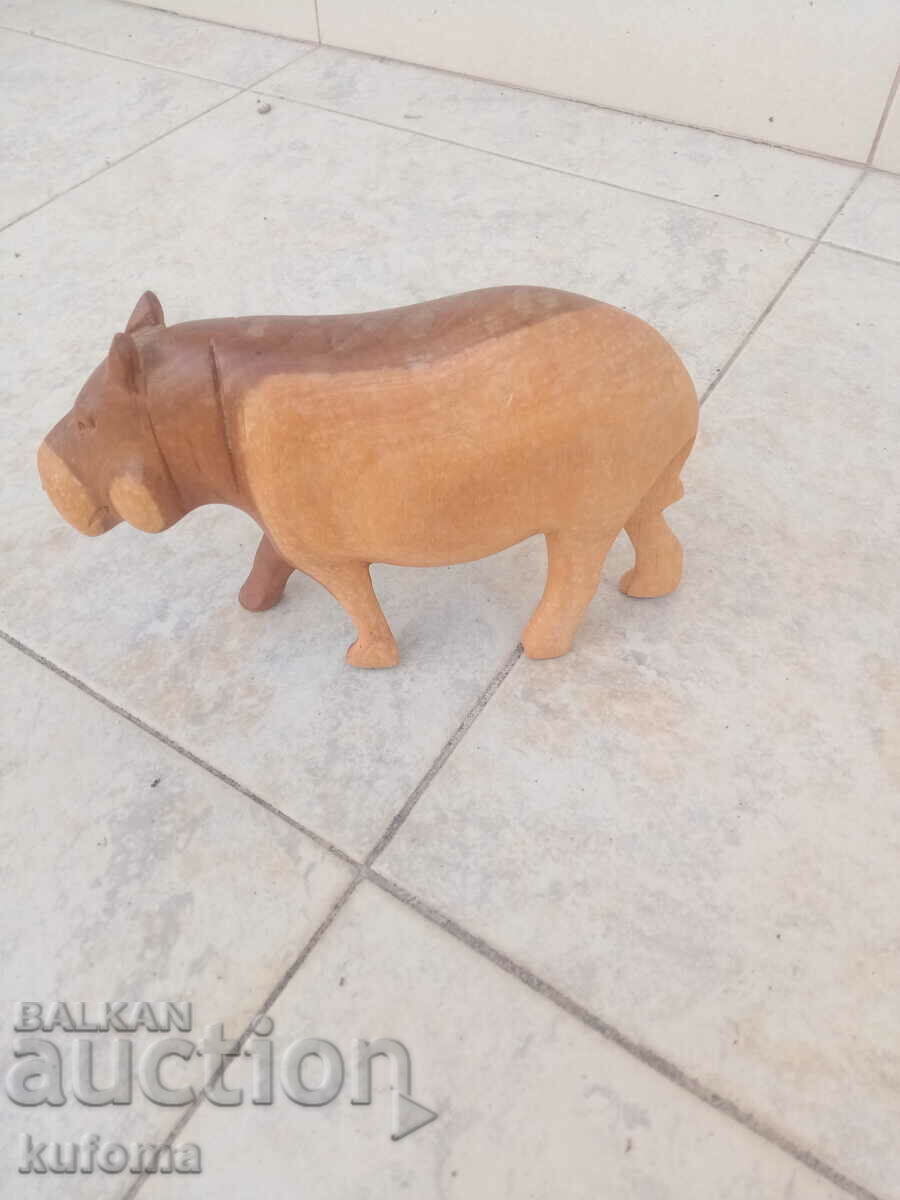 Auction Wooden figure of a hippopotamus Auction Wooden figure of a hippopotamus