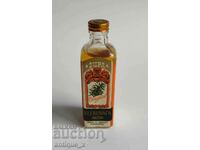 Collector's bottle with alcohol - brandy