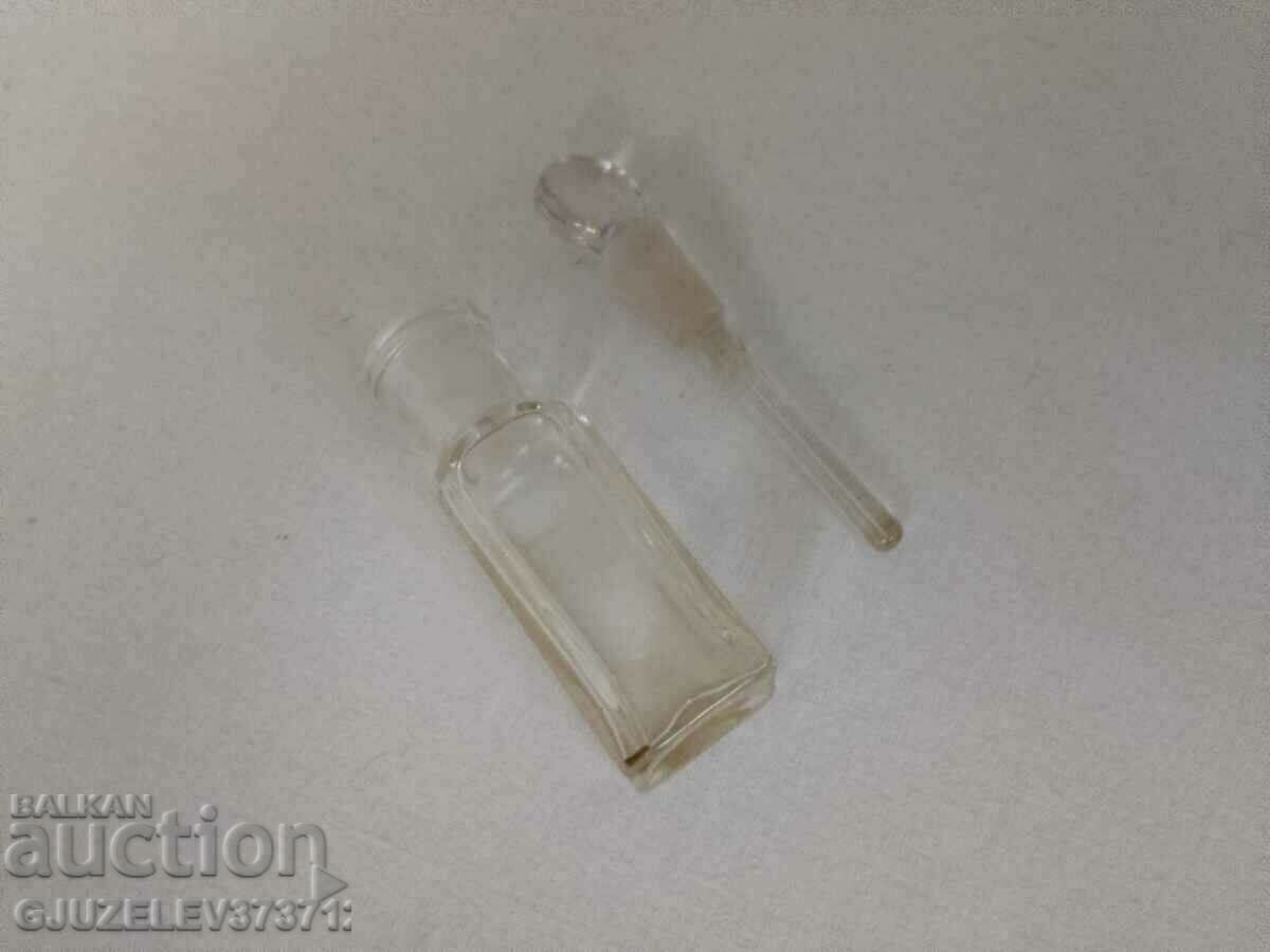 Vintage transparent glass bottle, perfume bottle with with price 30.00 BGN | € 15.34 Vintage transparent glass bottle, perfume bottle with with price 30.00 BGN | € 15.34
