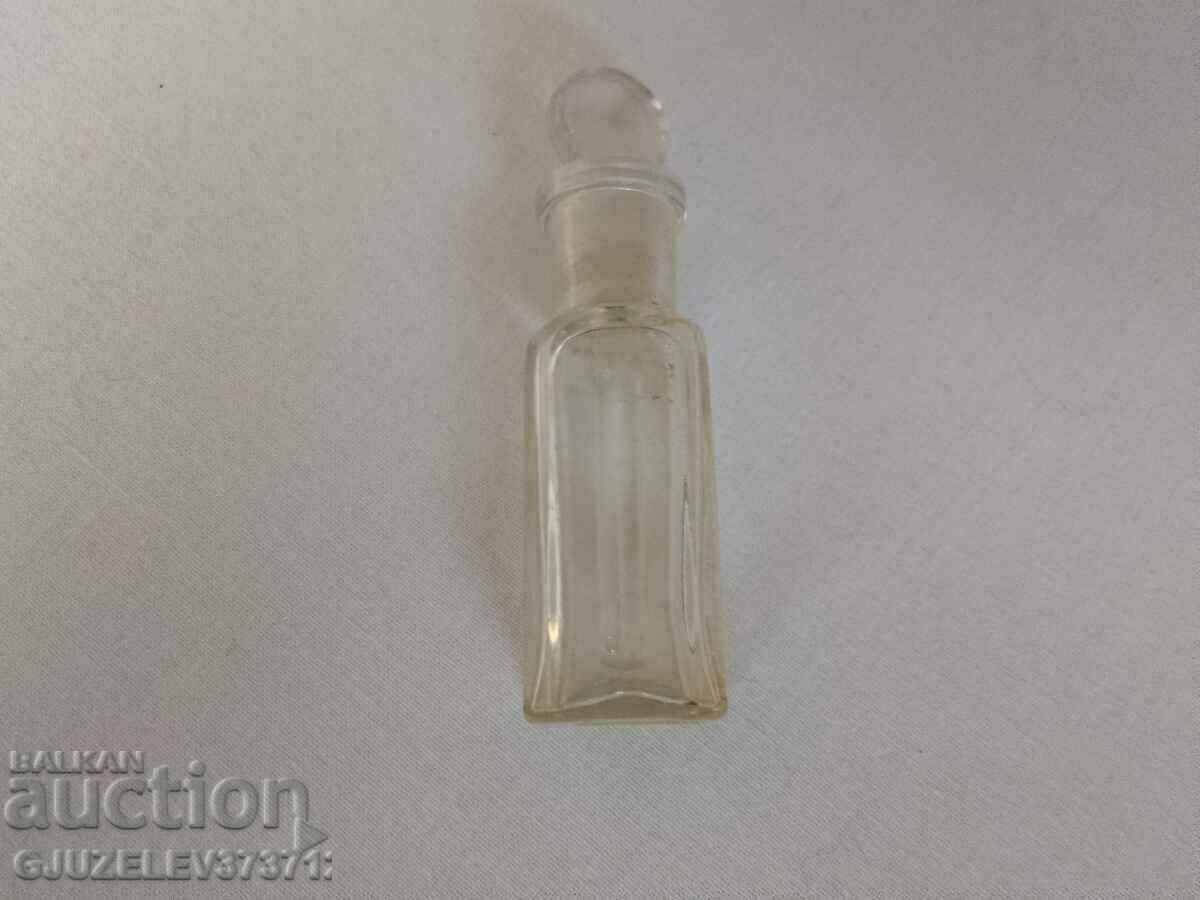 Auction Vintage transparent glass bottle, perfume bottle with Auction Vintage transparent glass bottle, perfume bottle with
