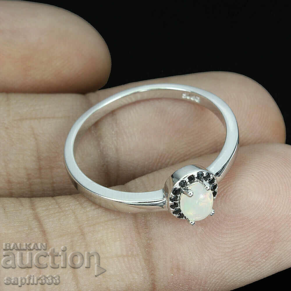 Auction FINE DESIGNER RING WITH NATURAL ETHIOPIAN OPAL, SPINEL Auction FINE DESIGNER RING WITH NATURAL ETHIOPIAN OPAL, SPINEL