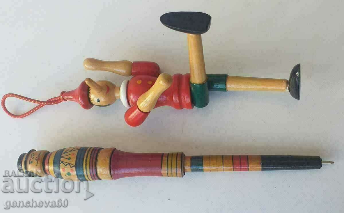 Attractive old pen-matryoshka and Pinocchio
