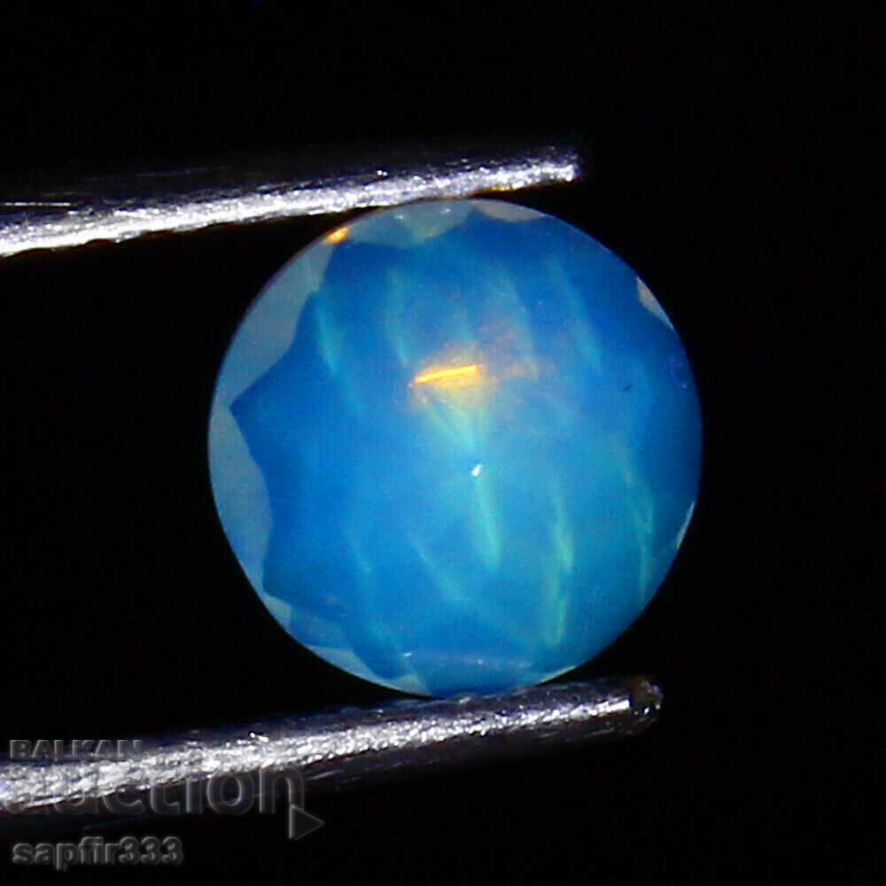 Auction 1.03 CARAT FAIRYTALE NATURAL ETHIOPIAN FIRE OPAL Auction 1.03 CARAT FAIRYTALE NATURAL ETHIOPIAN FIRE OPAL