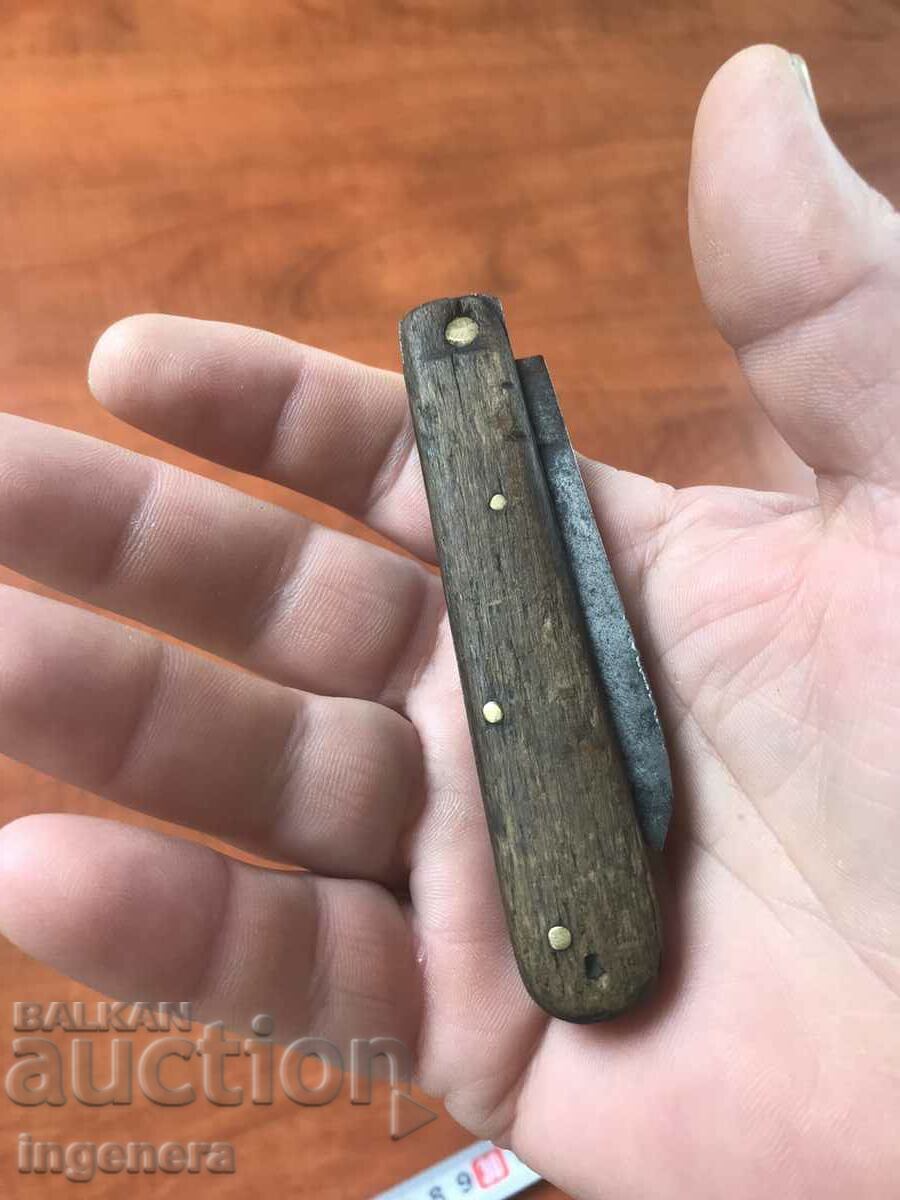 Auction KNIFE LEG FOLDABLE BLADE WITH WOODEN EDGES Auction KNIFE LEG FOLDABLE BLADE WITH WOODEN EDGES