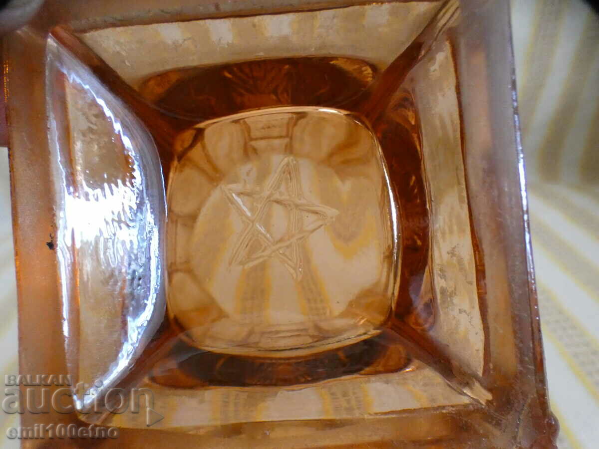 Delivery of An old vase of colored glass from the time of the soca with a pentagram Delivery of An old vase of colored glass from the time of the soca with a pentagram