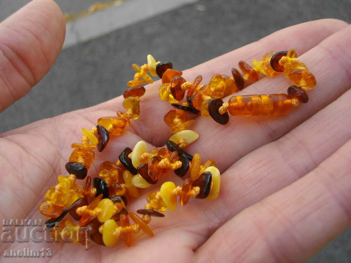 Delivery of NECKLACE NECKLACE NATURAL BALTIC AMBER Delivery of NECKLACE NECKLACE NATURAL BALTIC AMBER