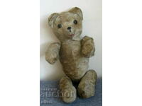 Old teddy bear Teddy straw embroidered muzzle glass eyes