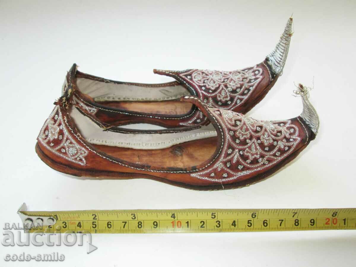 Old Muslim children's shoes for wearing leather and tinsel with price 100.00 BGN | € 51.13 Old Muslim children's shoes for wearing leather and tinsel with price 100.00 BGN | € 51.13