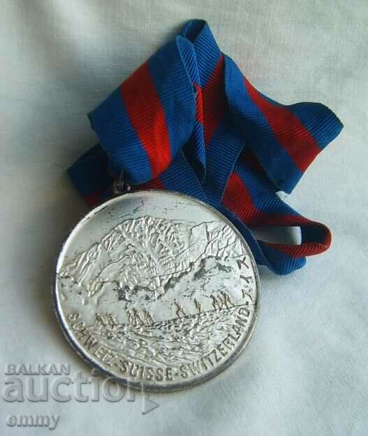 Delivery of Jungfrau Marathon Medal 2003, Switzerland Delivery of Jungfrau Marathon Medal 2003, Switzerland