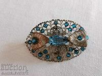 Old Women's Brooch with blue zircons and filigree