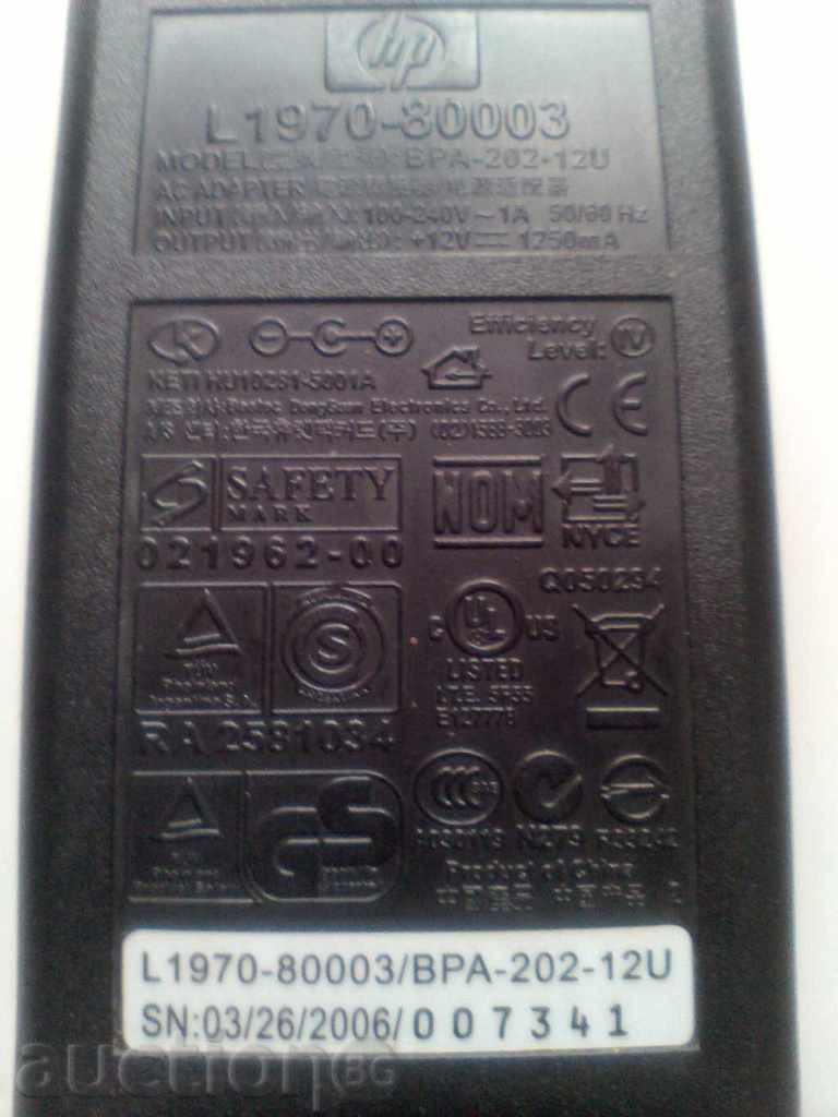 Laptop încărcător hp +12 V - 1250 mA cu preț 9.99 BGN | € 5.11