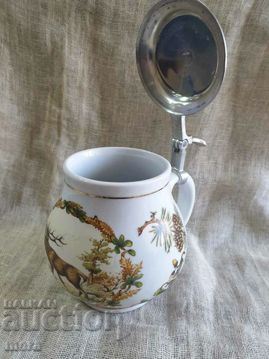 Delivery of German porcelain mug with hunting motifs Delivery of German porcelain mug with hunting motifs