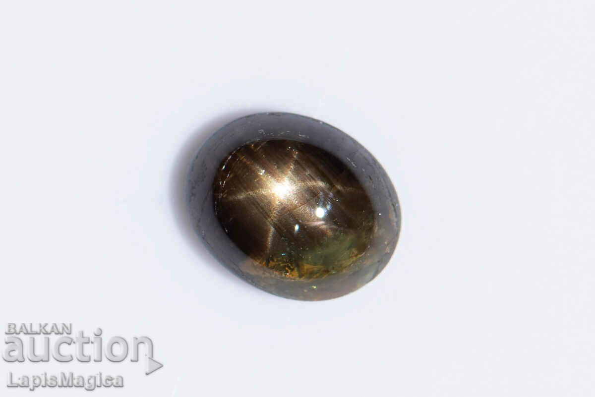 Black Star Sapphire 1,48ct Caboșon oval cu stele cu 6 raze