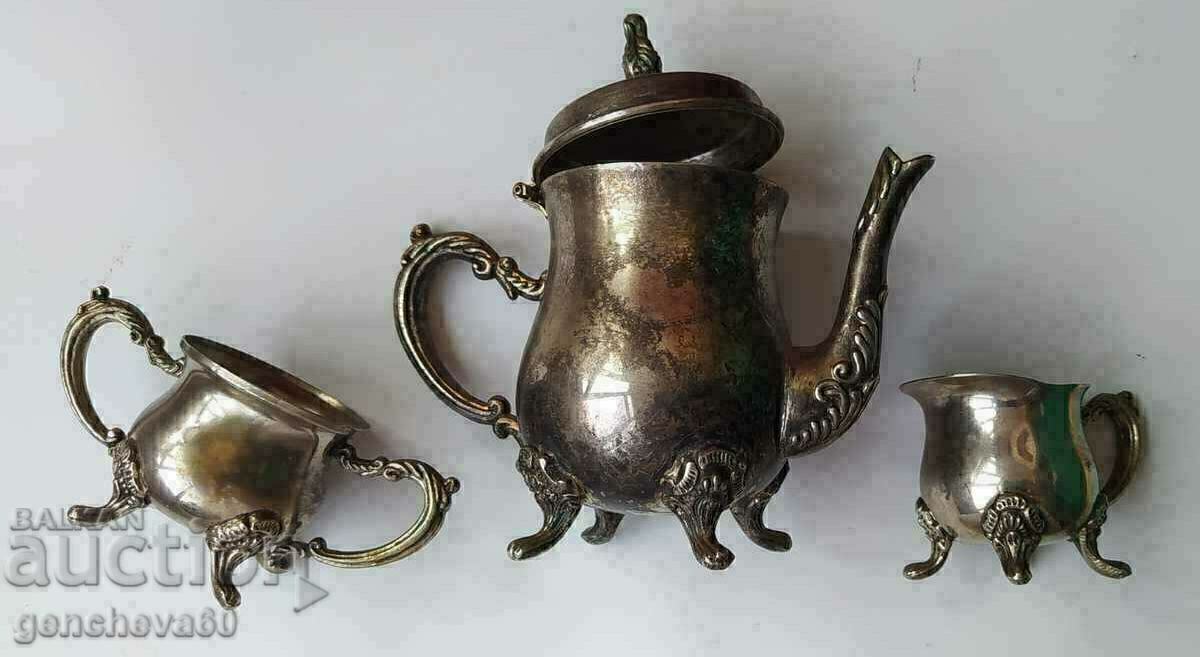 Auction Antique teapot, sugar bowl, cup, brass set Auction Antique teapot, sugar bowl, cup, brass set