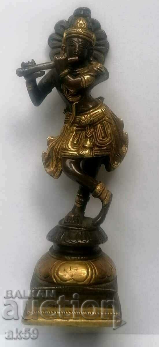 Playing Krishna - old figurine - small plastic bronze.