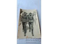 Photo Two soldiers on a walk