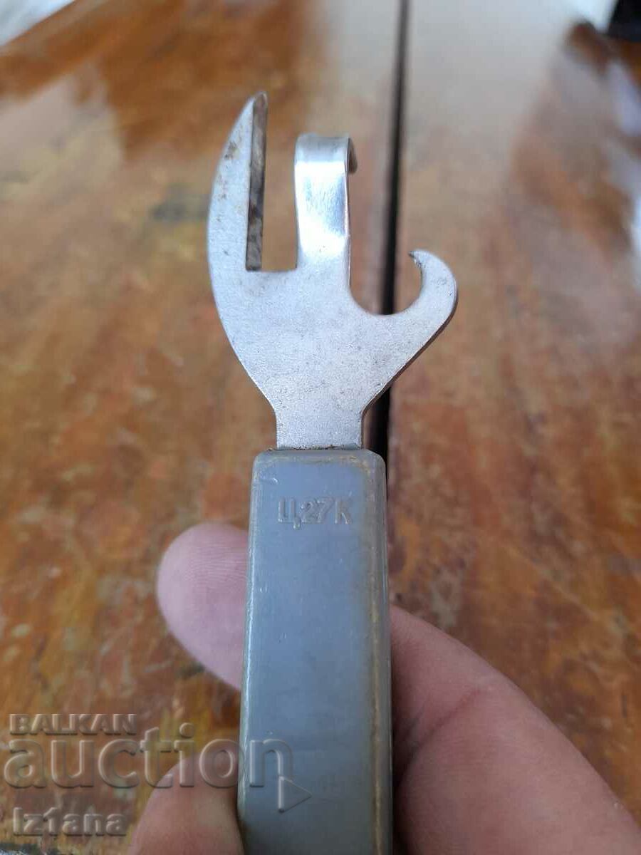 Auction  An old can opener