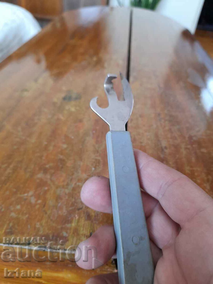 An old can opener - 5