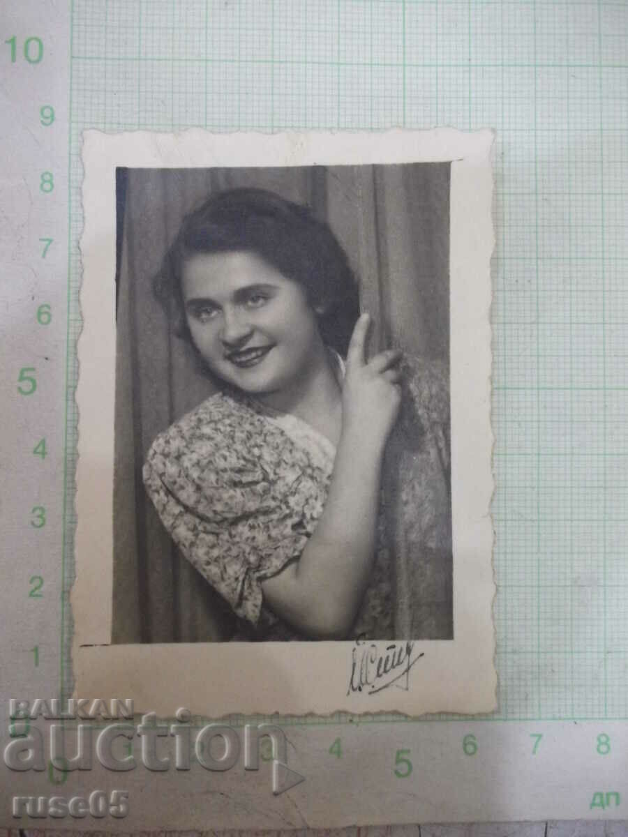Old photo of a young lady