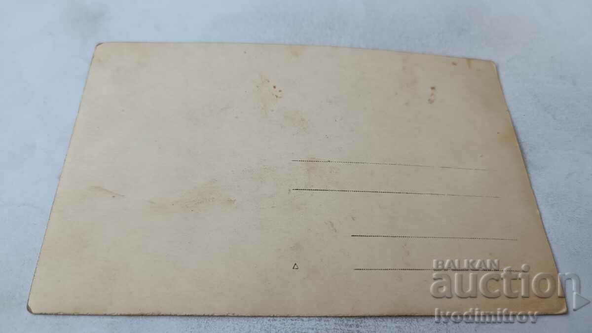 Photo Men women and children in front of a shop with price 2.85 BGN | € 1.46 Photo Men women and children in front of a shop with price 2.85 BGN | € 1.46